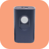 A small, rectangular, blue electronic device with a circular button in the center on a peach background.