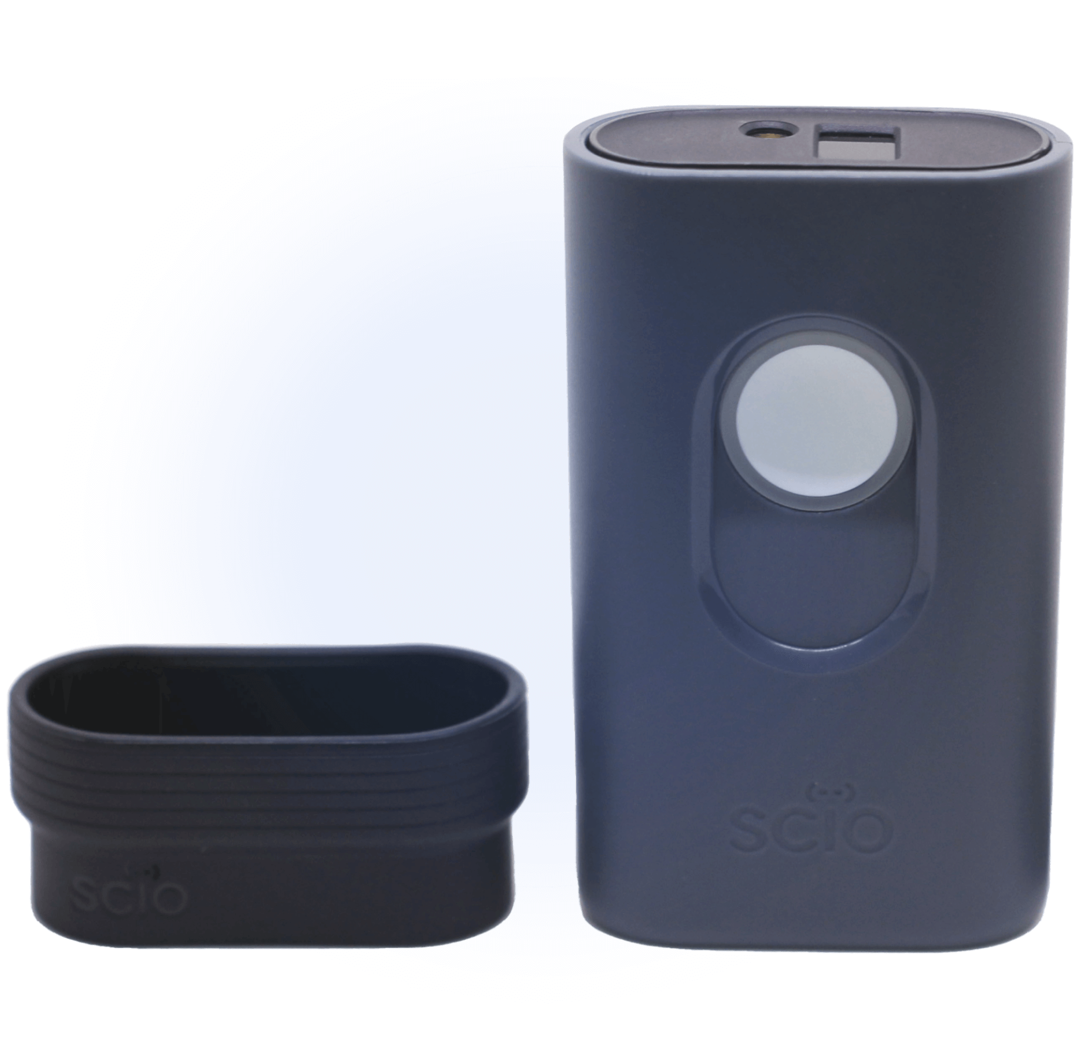A black, rectangular gadget with a circular button on the front. The lid is removed and placed beside it on a blue gradient background.